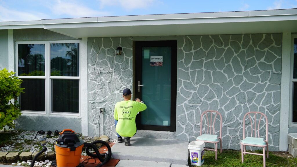 FHIA contractor installing an impact door