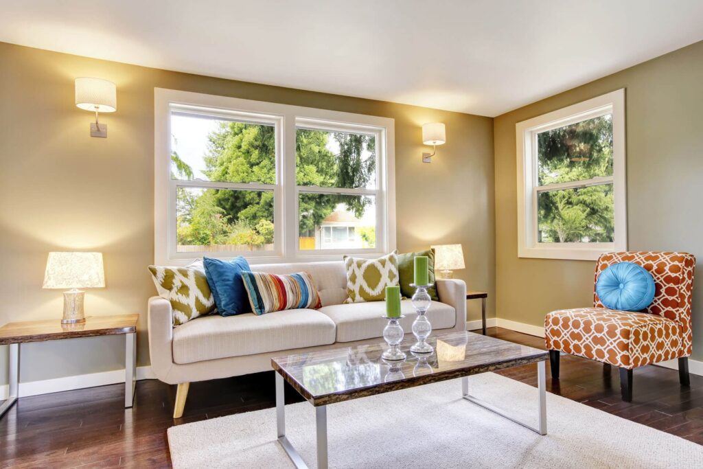 couch sitting in front of a window